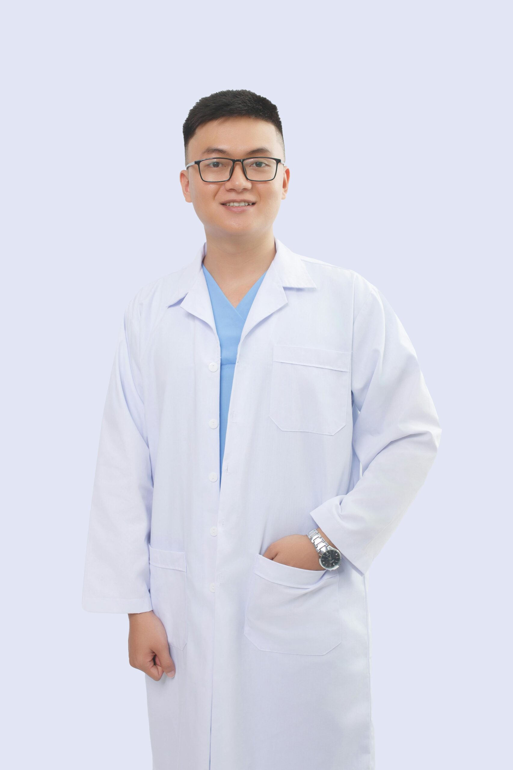 Portrait of Lab Manager in lab coat with a relaxed stance and smile